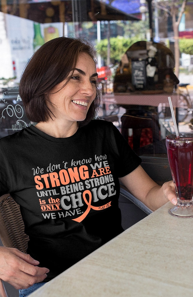 "How Strong We Are" Unisex T-Shirt - Black w/ Peach