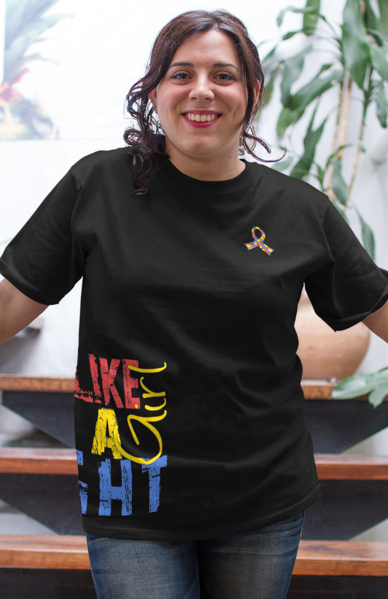 Woman wearing a black unisex t-shirt with the Fight Like a Girl Side Wrap design in autism puzzle colors printed on it.
