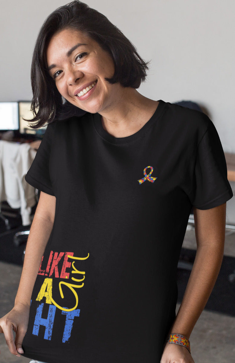 Woman wearing a black unisex t-shirt with the Fight Like a Girl Side Wrap design in autism puzzle colors printed on it.