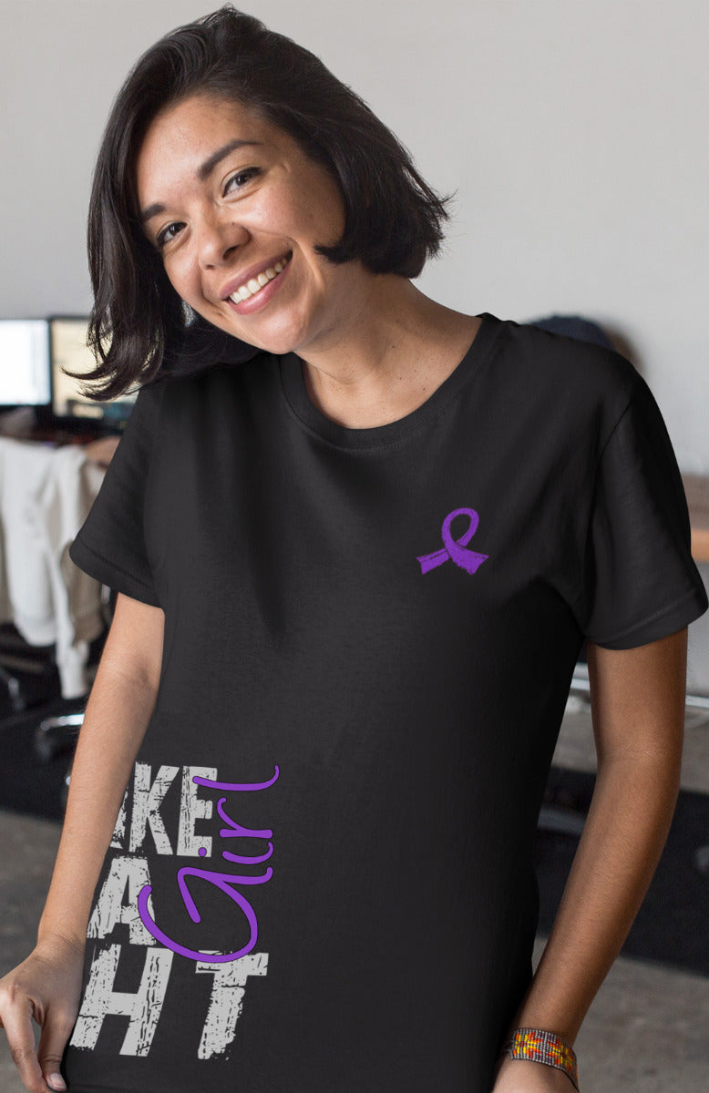 Woman wearing a black unisex t-shirt with the Fight Like a Girl Side Wrap design in purple printed on it.