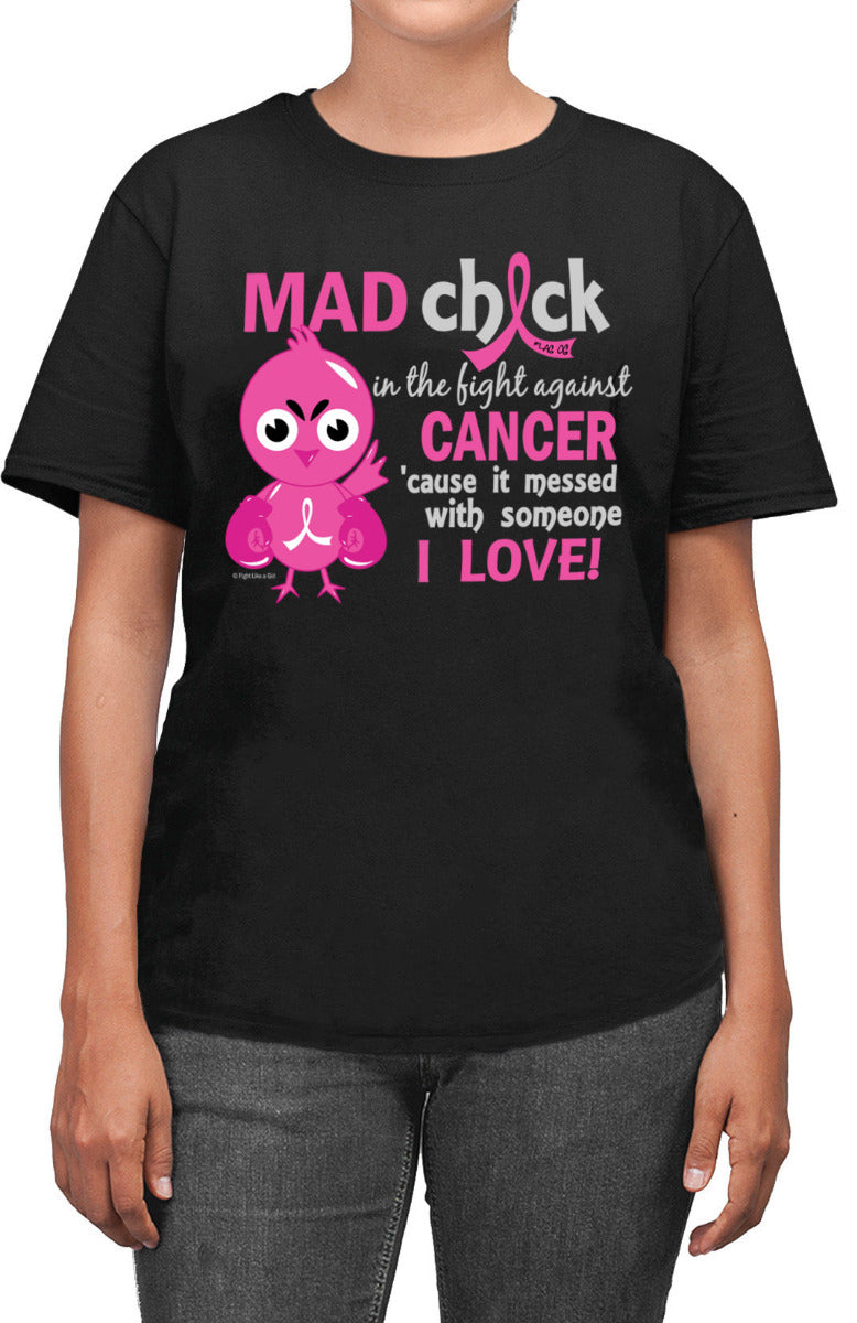 Woman wearing a black unisex t-shirt with the Mad Chick design in pink on the front.