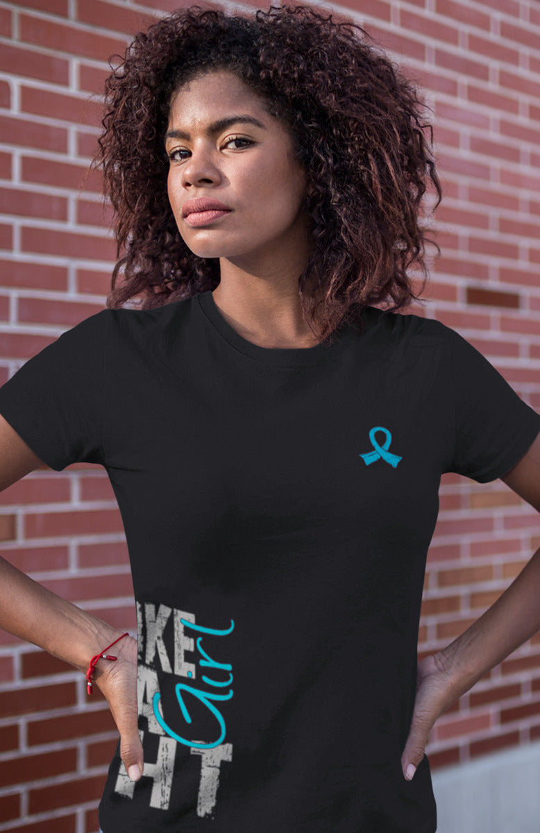 Woman wearing a black women's fit t-shirt with the Fight Like a Girl Side Wrap design in teal printed on it.