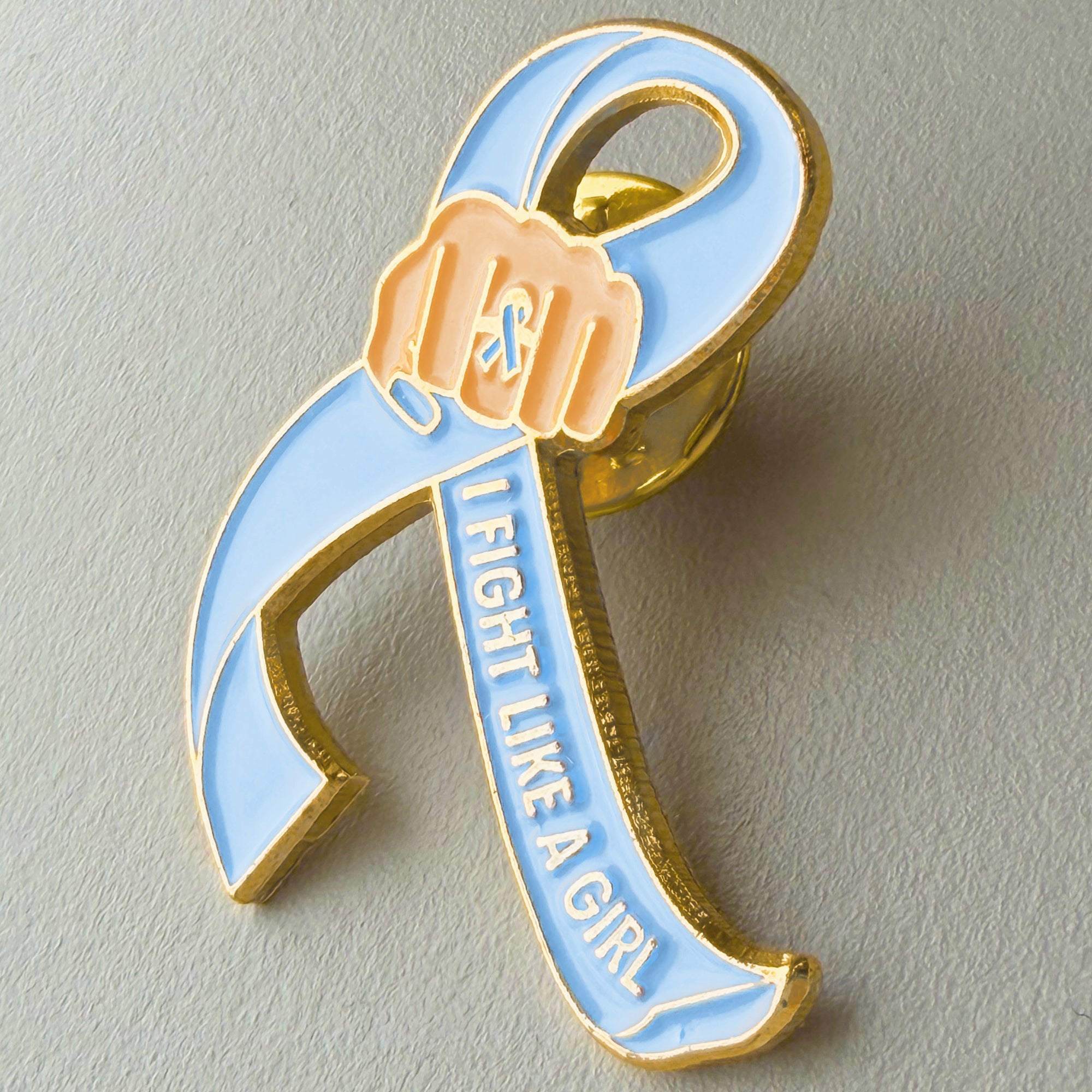 I Fight Like a Girl Fist Awareness Ribbon Lapel Pin - Light Blue