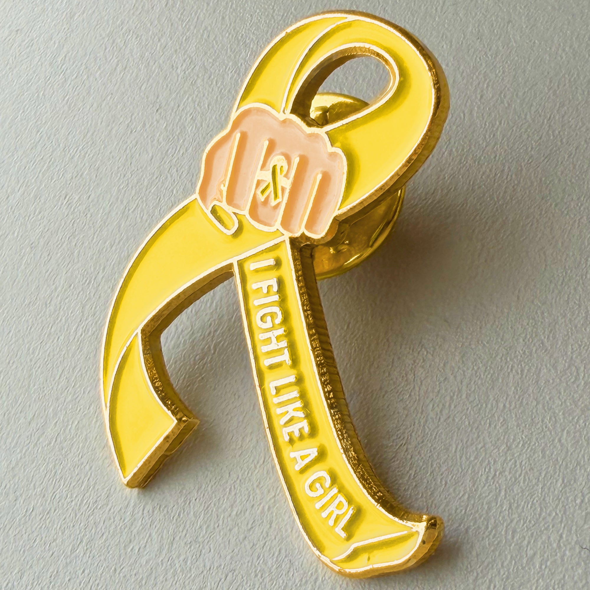 I Fight Like a Girl Fist Awareness Ribbon Lapel Pin - Yellow